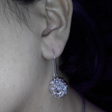 Silvertone Dangling Hollow Ball Swirl Hook Earrings